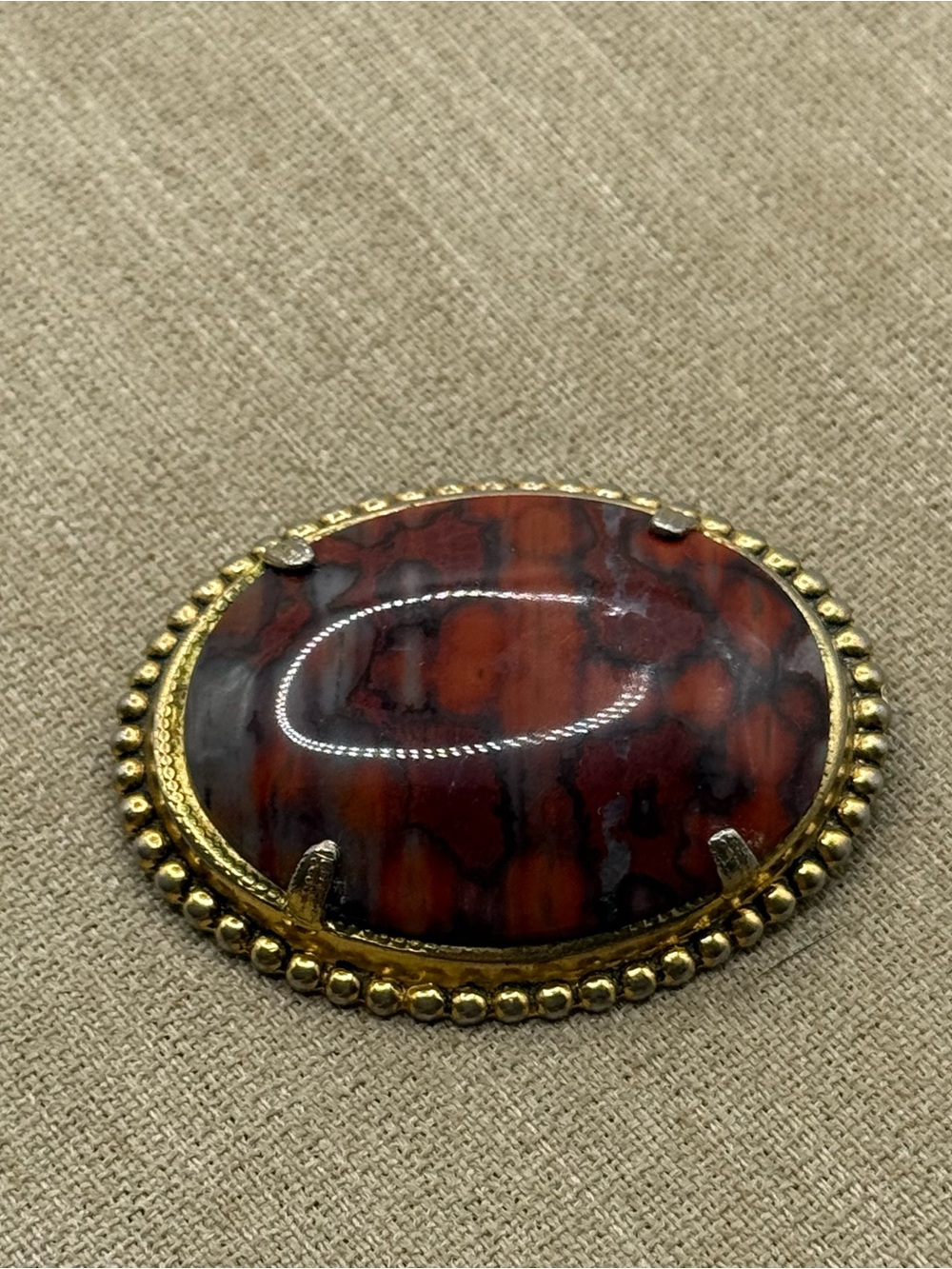 Gold-Tone Brass Brooch with Red Marbled Cabochon